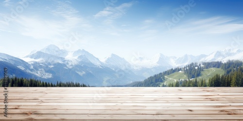 Mountain landscape on white wooden table top.