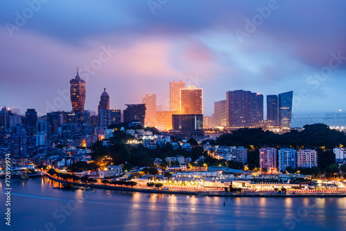 Aerial view of beautiful city skyline and modern buildings scenery in Macau at night © ABCDstock