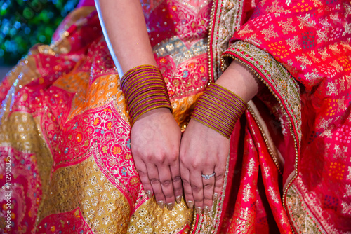 Indian bride's wedding jewelry jewellery close up © Stella Kou