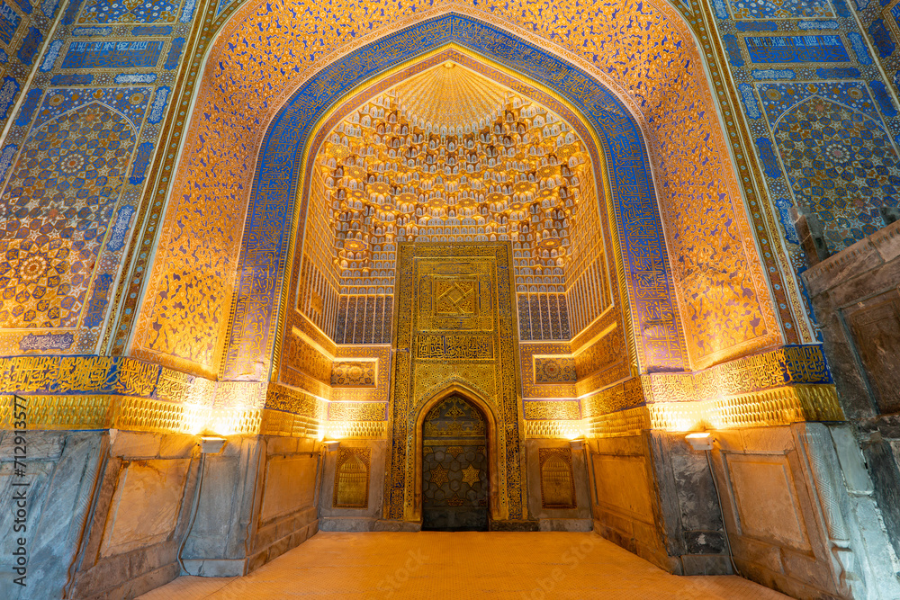 interior of the ornate interior of the madrasah, Registan Tilya Kori Madrasah mosaic pattern design background of ceramic tiles in Samarkand city, Uzbekistan
