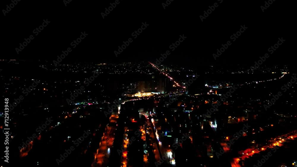 Nighttime cityscape with illuminated streets from above Nighttime cityscape with illuminated streets from above