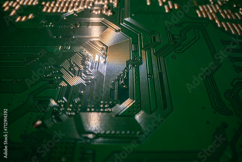 Electronic circuit board closeup. Electronic motherboard card. Circuitry and close-up on electronics. Background of electronics on board electrical circuits, technology texture. photo