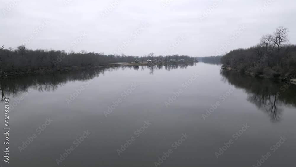 Flying low over river in the winter, aerial drone Flying low over river in the winter, aerial drone