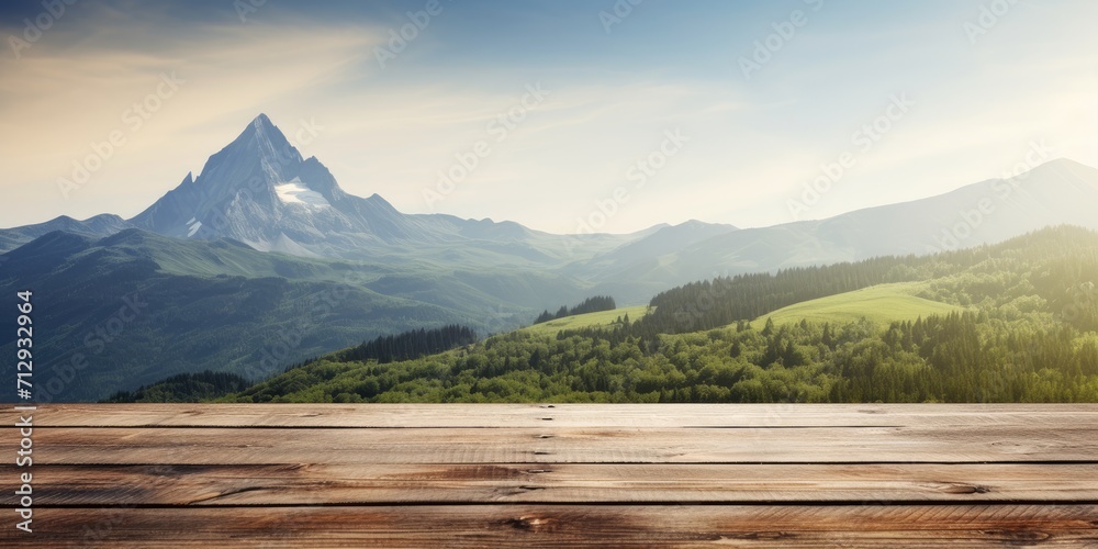 Mountain landscape on wooden table top.