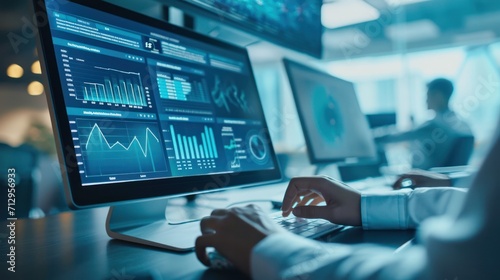 analyst uses computer and dashboard for data business analysis and Data Management System with KPI and metrics connected to the database for technology finance, operations, sales, marketing