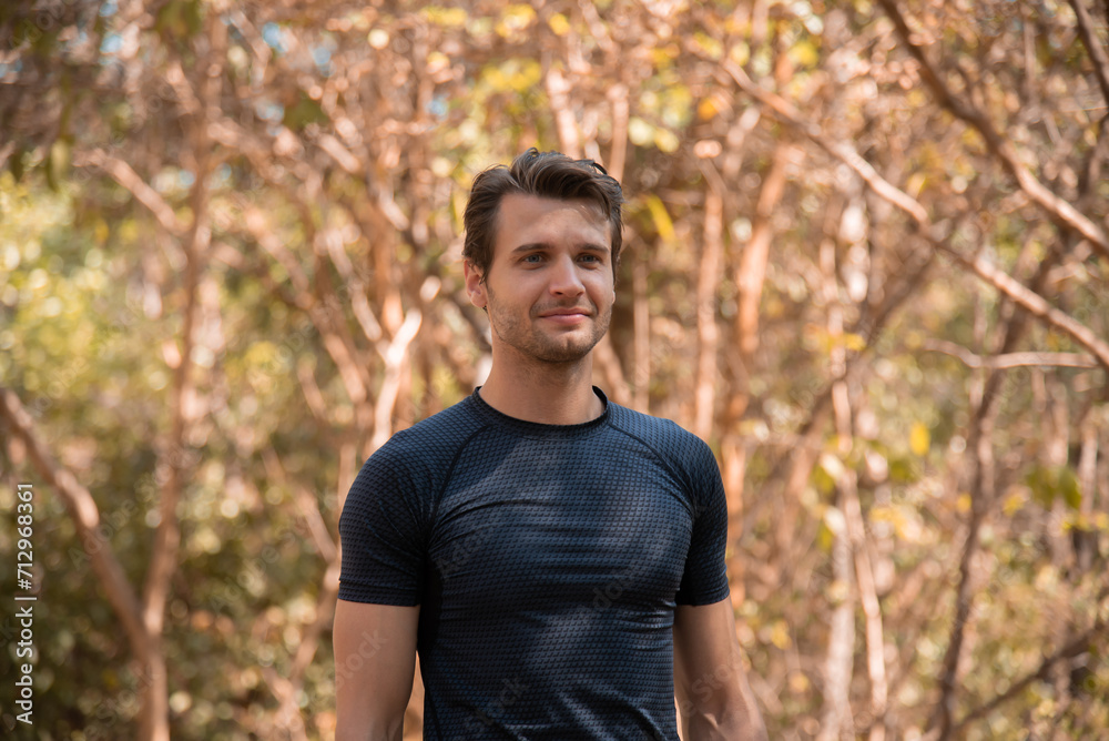 Portrait of happy caucasian handsome man confident and outdoors fitness. Muscular afro guy resting for a break after running outdoor. Fitness man taking a break after running workout. Portrait of happy caucasian handsome man confident and outdoors fitness. Muscular afro guy resting for a break after running outdoor. Fitness man taking a break after running workout.