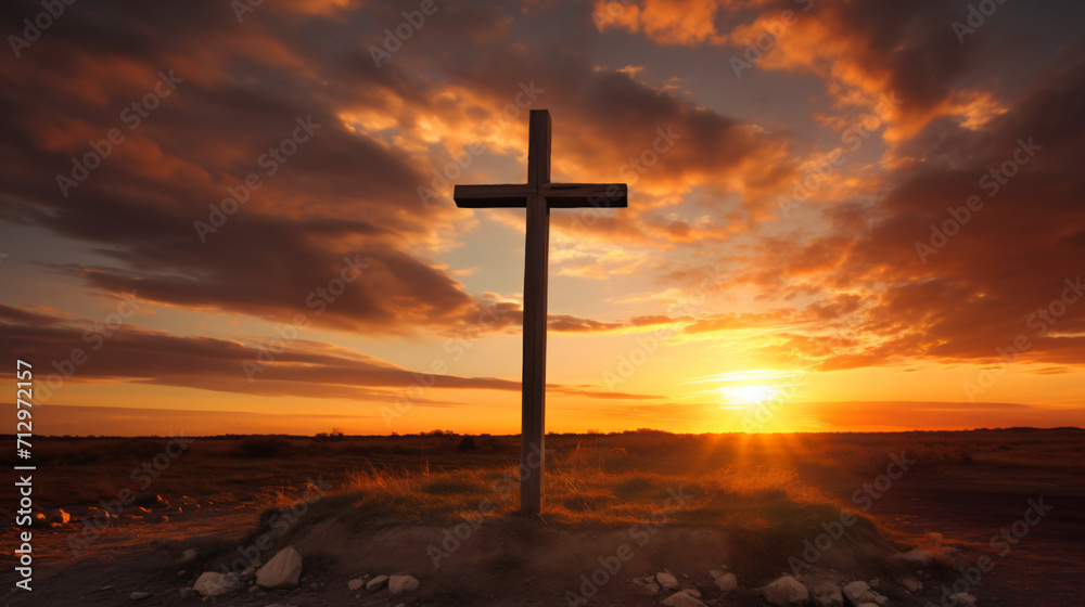 Sunrise clouds framed by a wooden cross