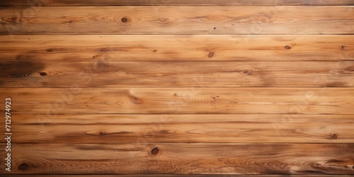 Empty wooden table viewed from above on abstract background for decorating, displaying, or editing products.
