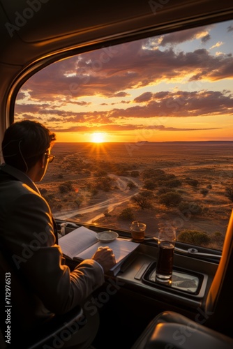 Business traveler capturing a beautiful sunset from the window of a high-speed train, Generative AI