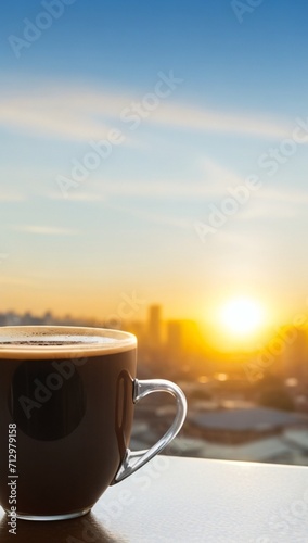 cup of coffee on sunset background