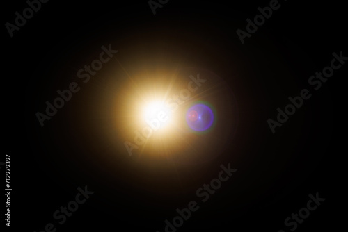 Easy to add lens flare effects for overlay designs or screen blending mode to make high-quality images. Abstract sun burst  digital flare  iridescent glare over black background.