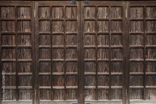                   photo of old decayed wooden fence