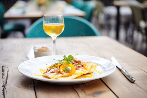 crepe suzette served on outdoor cafe table