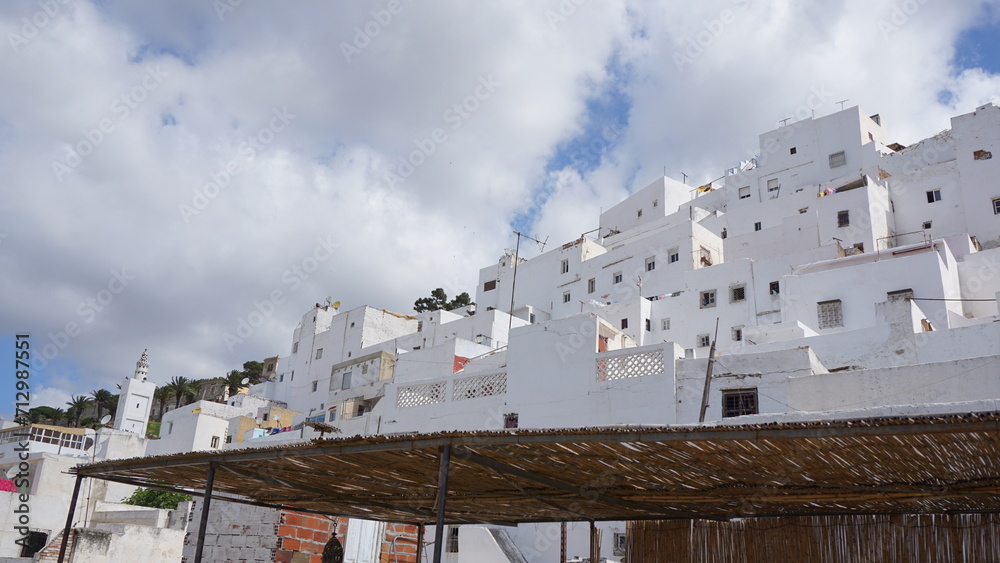 Beautiful white buildings under the blue cloudy sky in beautiful Morocco