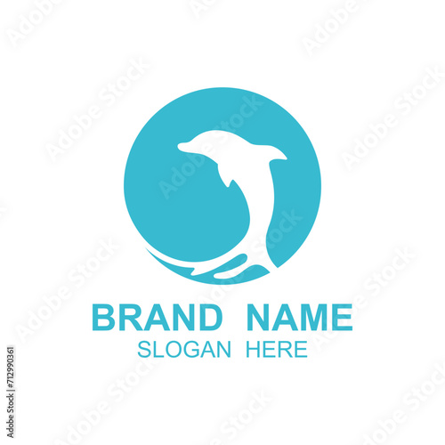 Dolphin logo vector with jumping position .This logo is suitable for travel company  diving or water adventure.