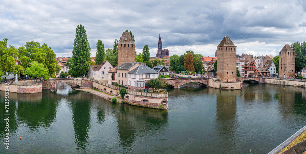 Panoramic view on The Ponts Couverts in Strasbourg with blue cloudy sky. France.