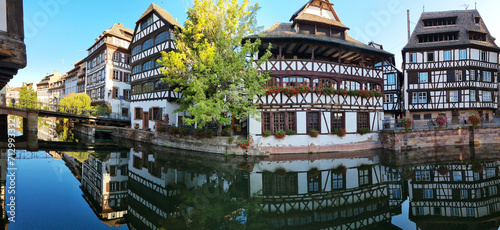 Le Petite France, the most picturesque district of old Strasbourg. Half-timbered houses with reflection in waters of the Ill channels.