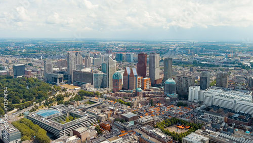 The Hague, Netherlands. Business center of The Hague. Large train station Den Haag Centraal. Cloudy weather. Summer day, Aerial View photo