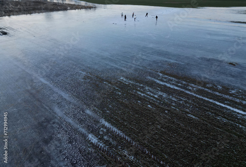 Photography flooded field is a very nice skating rink, apart from the damage to farmer