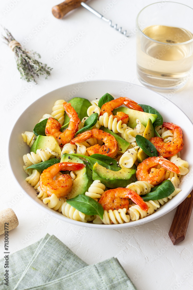 Pasta salad with shrimps, avocado and spinach. Healthy eating. Seafood. Pasta salad with shrimps, avocado and spinach. Healthy eating. Seafood.
