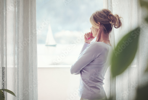 Mature woman standing next to a window Free Download Mature woman standing next to a window - GFXLoad