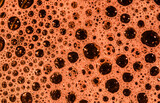Niepowtarzalne pomarańczowe tło struktura okrągłe otwory bańki dziurki