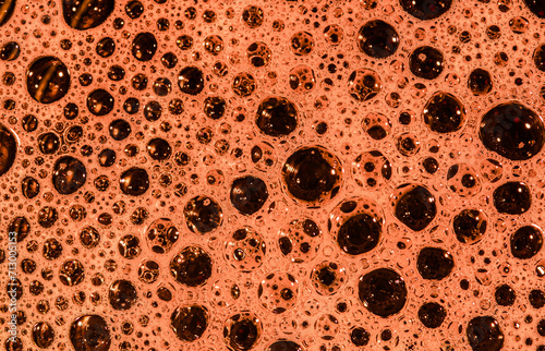 Niepowtarzalne pomarańczowe tło struktura okrągłe otwory bańki dziurki