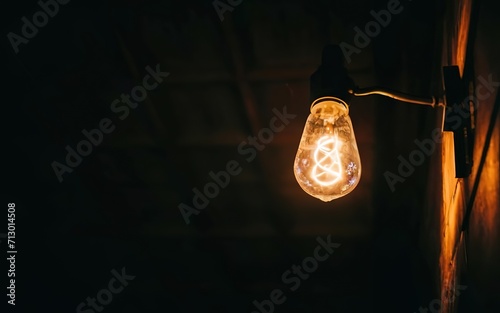 Single lamp light bulb light up at night with Dark background © Lifetime Design