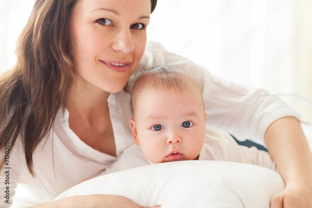 Portrait of mother and child laughing and playing Portrait of mother and child laughing and playing