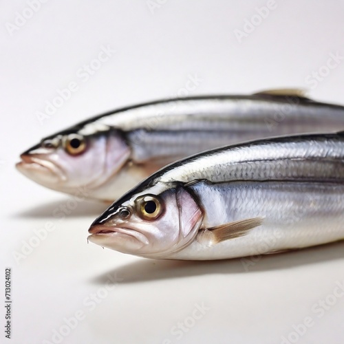 herring lies on a white background, one herring lies on a white background