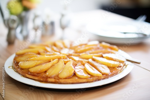 tarte tatin with caramelized apples on a serving plate