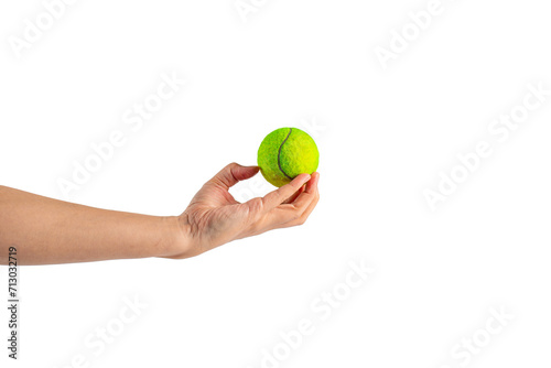 Tennis ball in hand on transparent background  © apinya