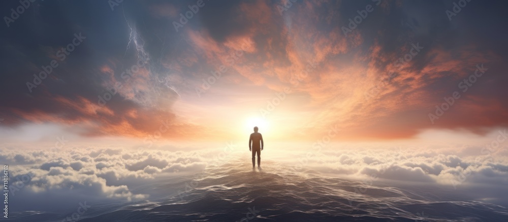 Man stands on the edge of the abyss and looks at the sea. alone person looking at heaven.