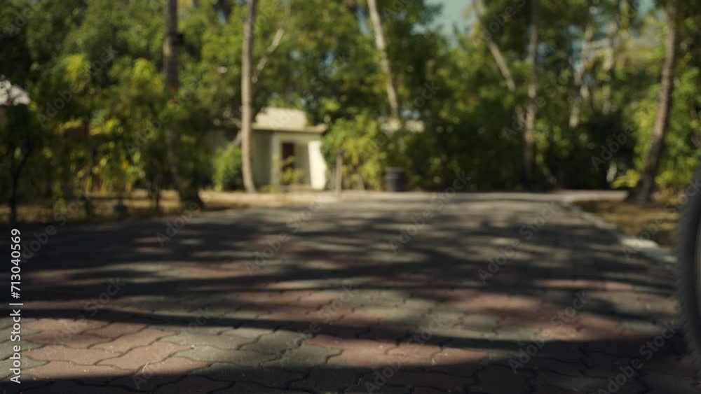 Woman putting her foot on a bicycle pedal in slow motion Woman putting her foot on a bicycle pedal in slow motion