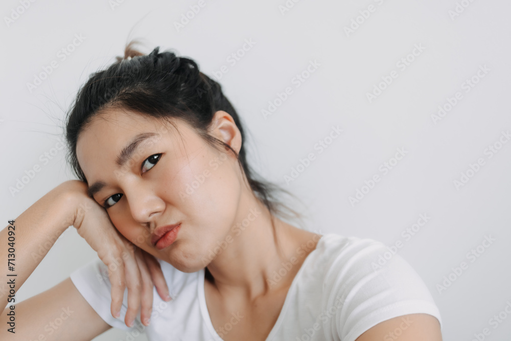 Asian Thai woman take selfie with bored face, unhappy boring time isolated over white background wall. Asian Thai woman take selfie with bored face, unhappy boring time isolated over white background wall.