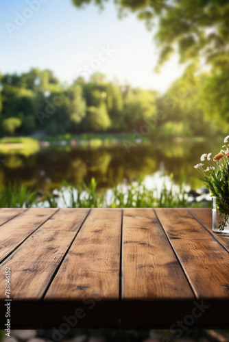 Wooden table spring nature bokeh background, empty wood desk product display mockup with green park sunny blurry abstract garden backdrop landscape ads showcase presentation. Mock up, copy space.