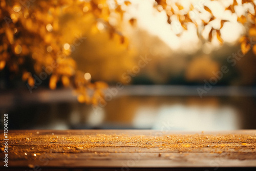 Empty blank wooden table fall background with autumn trees orange yellow color leaves backdrop forest or park nature scene abstract blurred bokeh tabletop for product display desk mockup. Copy space. © Synthetica