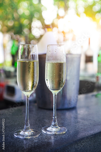 Glasses of champagne in outdoor resort bar