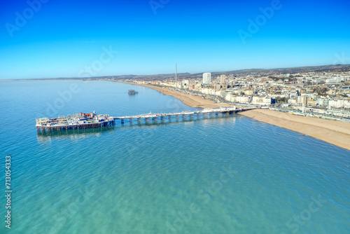 Aerial view of the Victorian Palace Pier in Brighton, a popular attraction at this popular resort City in East Sussex, England. photo