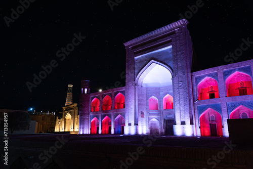 Khiva, Uzbekistan night lights and gorgeous old town, Kutlug Murad Inak Madrasah photo