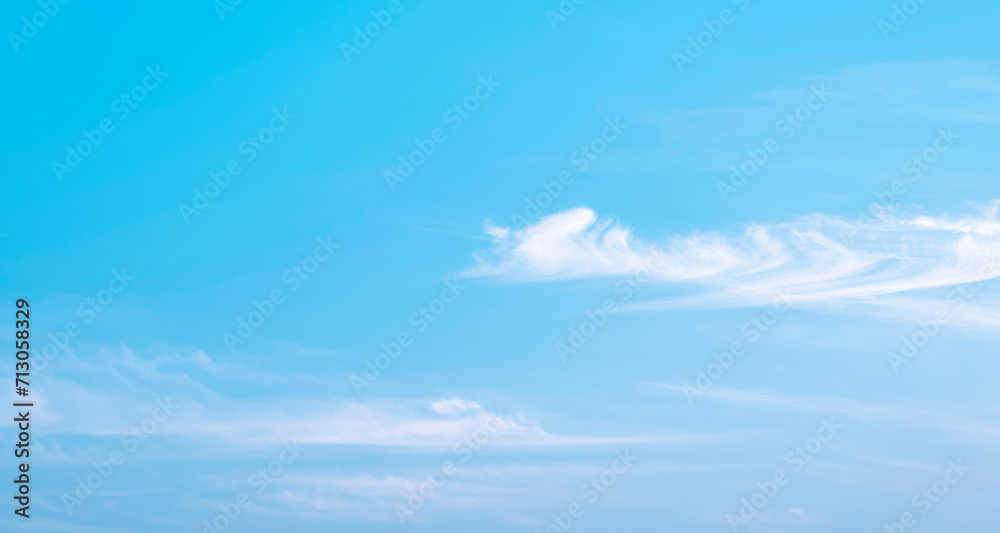 Pastel blue sky background with softly white fluffy cloud in the morning, Idyllic natural Horizon cloudscape view backdrop with copy space