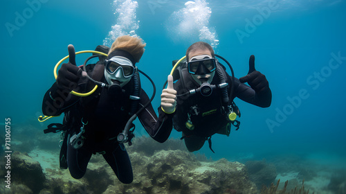 Scuba divers underwater © Mishi