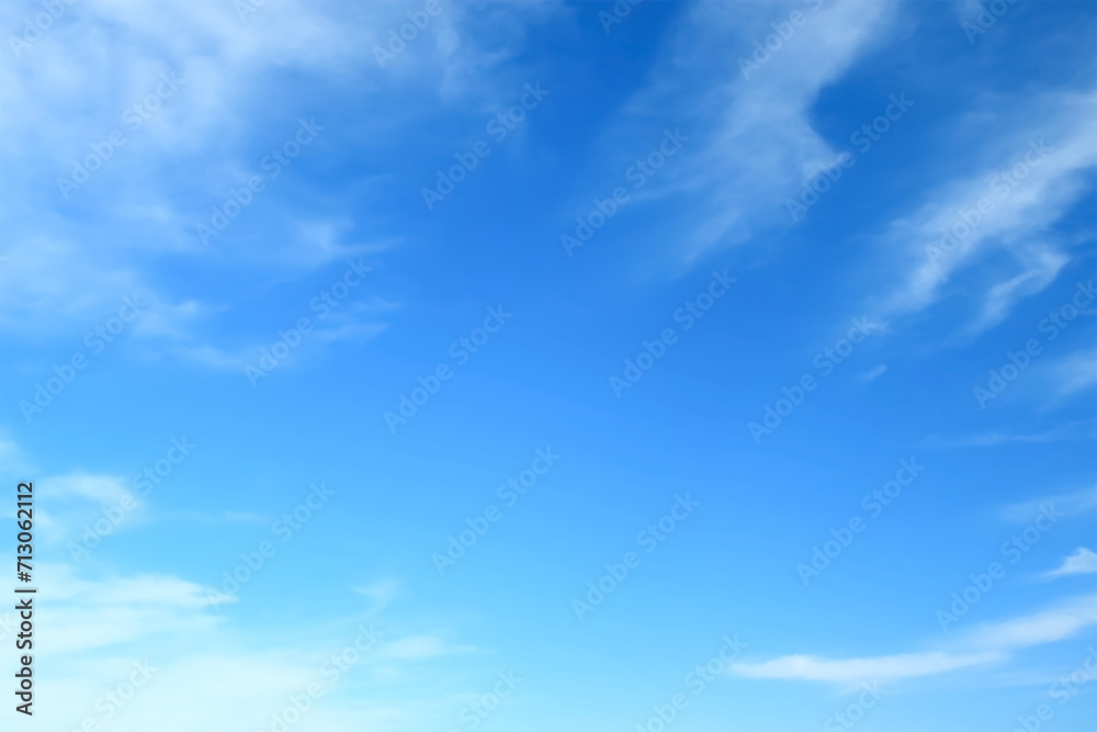 Perfect blue cloudy sky with fleecy cirrostratus clouds floating in round. Heaven paradise.