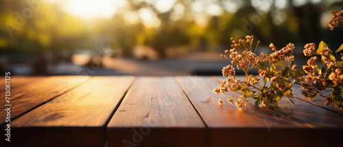 Wooden table spring nature bokeh background, empty wood desk product display mockup with green park sunny blurry abstract garden backdrop landscape ads showcase presentation. Mock up, copy space. photo