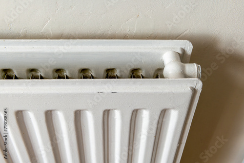 Close up of a  central heating radiator. photo