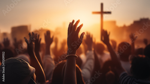 Print op canvas Christianity concept with worshipers raising hands up in front of religious cros