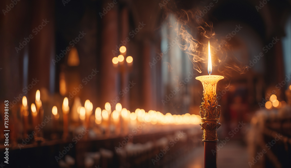 Burning candle on church Easter service - obrazy, fototapety, plakaty 