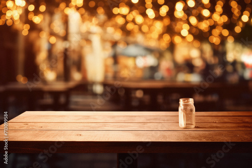 Wooden cafe table bokeh background, empty wood desk restaurant tabletop counter in bar or coffee shop surface product display mockup with blurry city lights backdrop presentation. Mock up, copy space.