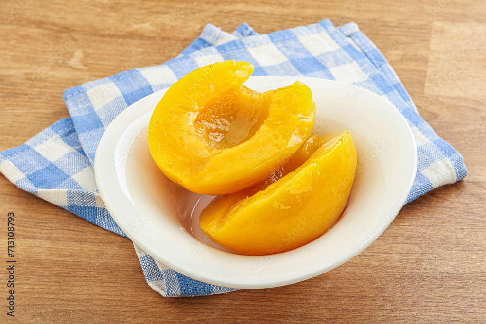 Sweet canned peaches with syrope Sweet canned peaches with syrope