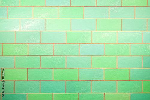 surface covered with tiles in different shades of green